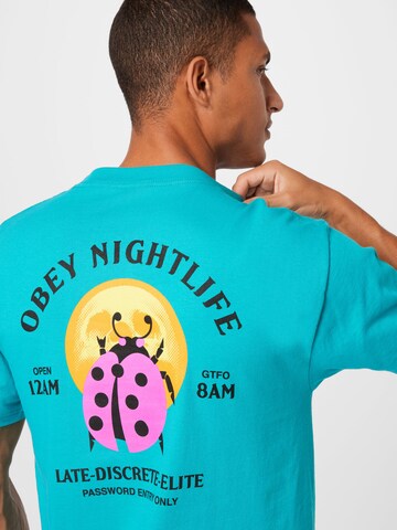 Obey Shirt 'Buggin' out nightlife' in Blauw