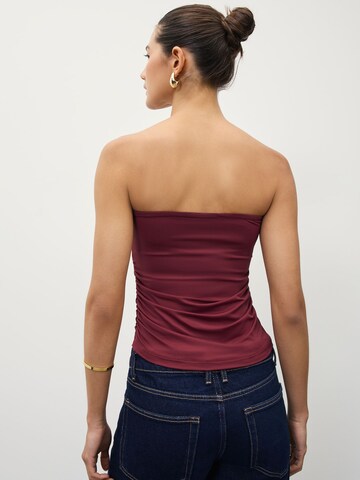 Next - Top en rojo