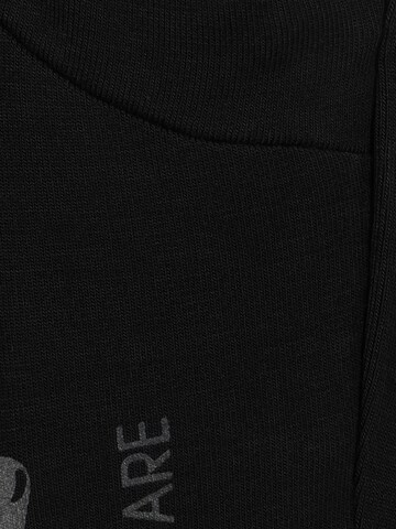 Coupe slim Pantalon de sport CURARE Yogawear en noir