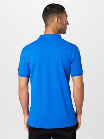 Tricou de la Calvin Klein Jeans pe albastru