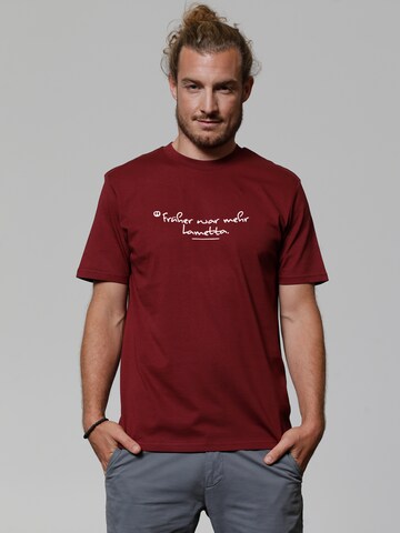 T-Shirt 'Früher War Mehr Lametta' Watapparel en rouge : devant