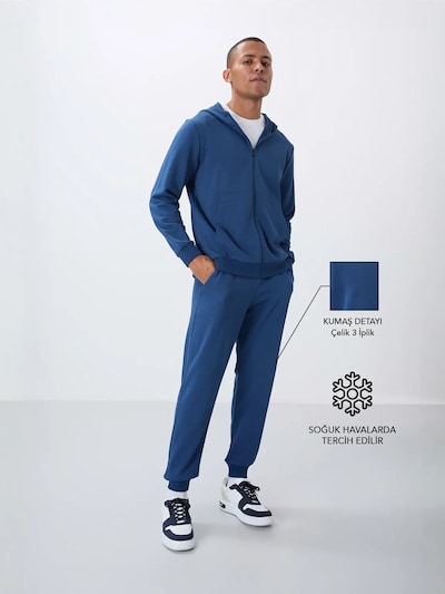 Tuta da jogging in L Tommy Life di colore blu, Visualizzazione prodotti