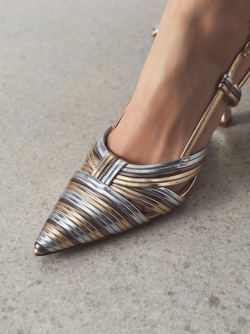 Next Slingpumps i guld