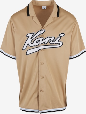 Coupe regular Chemise Karl Kani en beige : devant