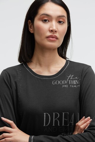 Soccx Langarmshirt mit Print und Schmucksteinen in Schwarz