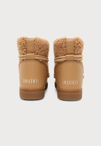 INUIKII - Botas de nieve 'CURLY' en beige