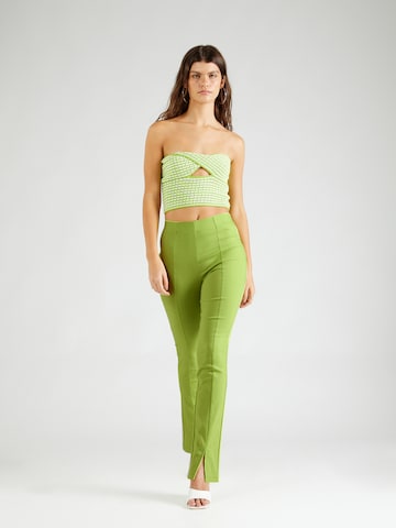 ABOUT YOU x Laura Giurcanu Flared Broek 'Joelle' in Groen