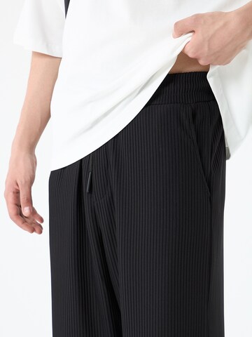 Loosefit Pantaloni di VAMOS CLO in nero