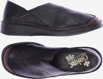 Rieker Flats & Loafers in 39 in Black: front