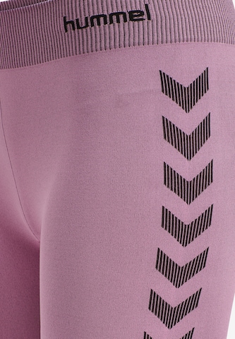 Hummel Skinny Spodnie sportowe 'First' w kolorze fioletowy