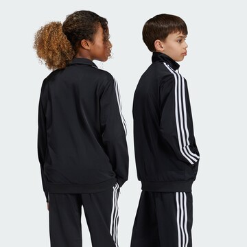 ADIDAS ORIGINALS - Casaco em moletão 'Adicolor Firebird' em preto