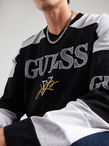 juoda GUESS JEANS Marškinėliai 'HOCKEY'
