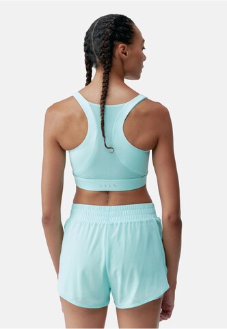 Bustier Soutien-gorge de sport 'Padma' Born Living Yoga en vert