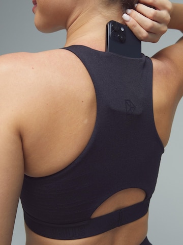 DRILLS Apparel High neck Sports bra in Black