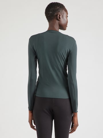 CURARE Yogawear Спортна плетена жилетка в зелено