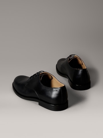 Chaussure à lacets 'ESS' Calvin Klein en noir