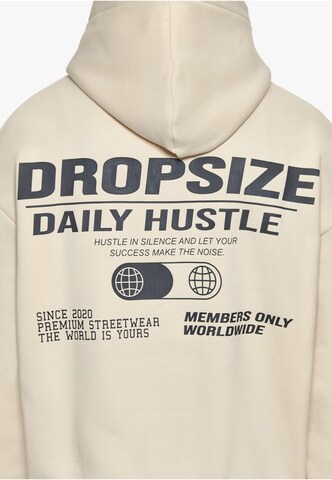 Sweat-shirt 'Hustle In Silence' Dropsize en beige