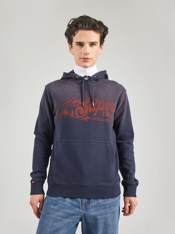 Sweat-shirt Superdry en bleu : devant