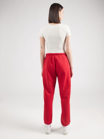 Tapered Pantaloni 'BRKLN FLC' di Jordan in rosso