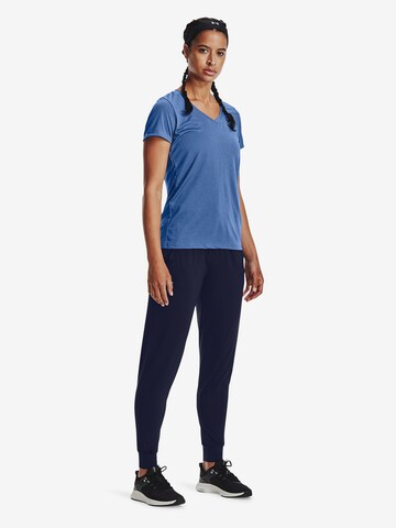 UNDER ARMOUR Tapered Sportbroek in Blauw