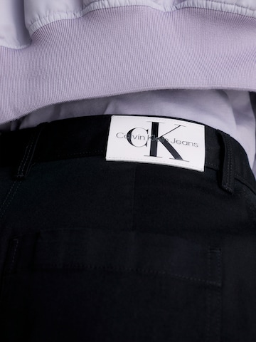 Calvin Klein JeansLoosefit Cargo hlače - crna boja