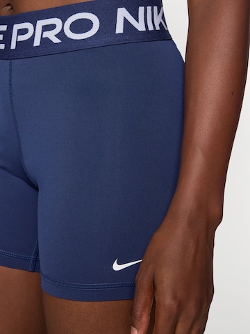 Skinny Pantaloni sportivi 'Pro 365' di NIKE in blu