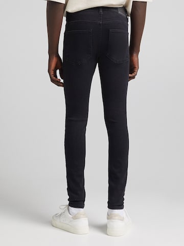 Skinny Jeans di Bershka in nero