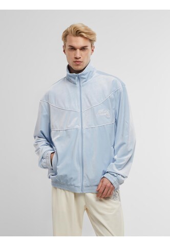 Karl Kani Jacke in Blau: Vorderseite