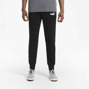 PUMA Tapered Sportsbukser i sort: forside