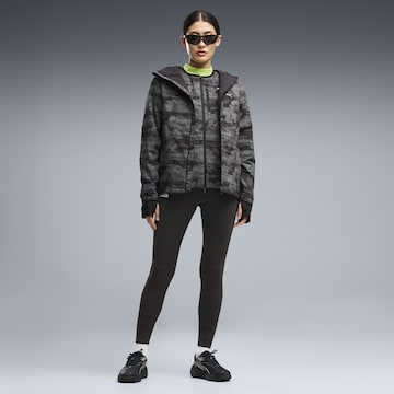 Veste de sport 'Run Brightstride' PUMA en noir