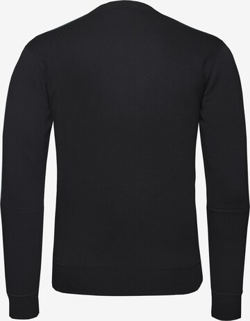 Champion Authentic Athletic Apparel Sweatshirt in Black