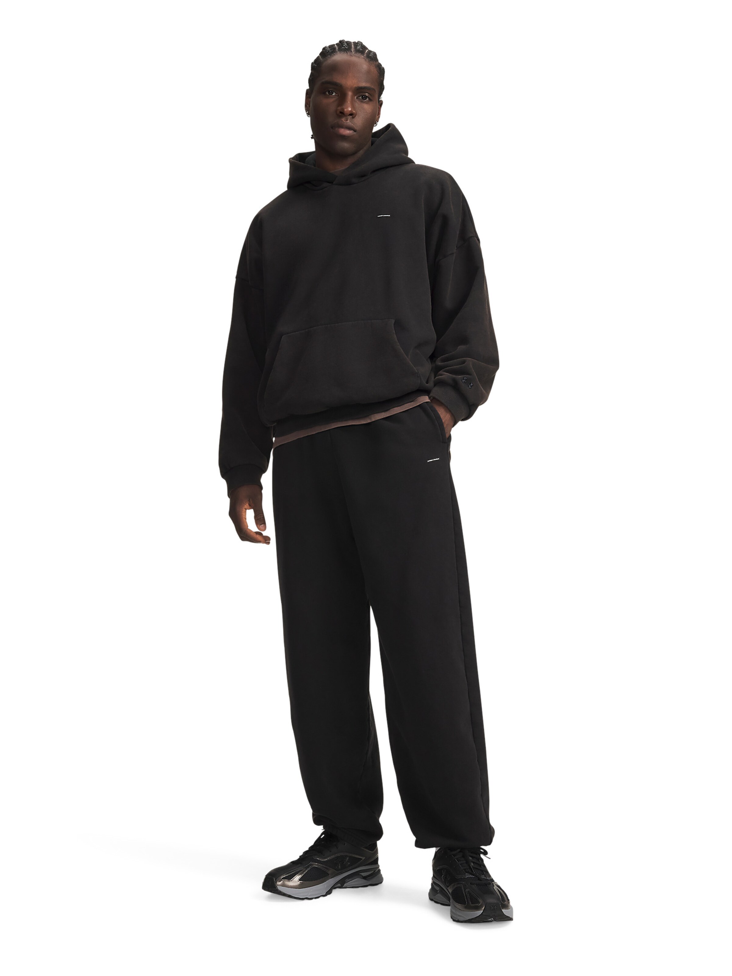UNDER ARMOUR Regular Sports trousers in Black: front
