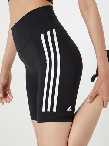 ADIDAS SPORTSWEAR Skinny Sportbroek 'Optime Trainicons 3-Stripes Bike' in Zwart