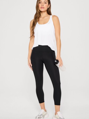 Fabletics Regular Hose 'OASIS HIGH-WAISTED CAPRI' in Schwarz