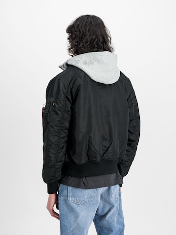 ALPHA INDUSTRIES Välikausitakki 'MA-1 D-Tec' värissä musta