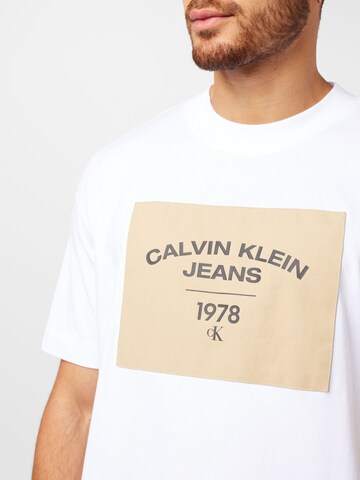 Calvin Klein Jeans Bluzka sportowa w kolorze biały