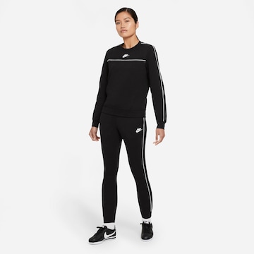 juoda Nike Sportswear Siaurėjantis Kelnės