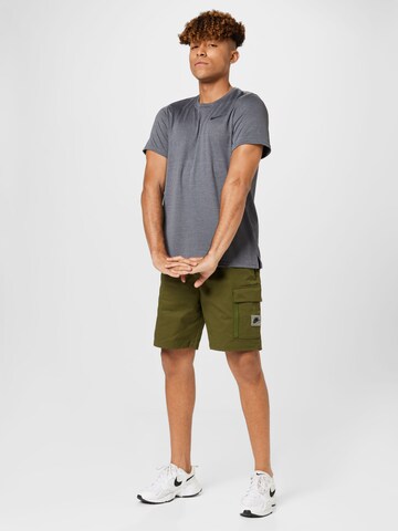 Nike Sportswear - regular Pantalón en verde