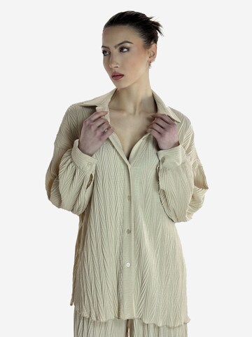 Elara Buksedragt i beige