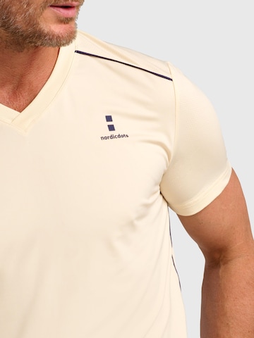 nordicdots - Camiseta funcional 'Performance V-Tee' en amarillo
