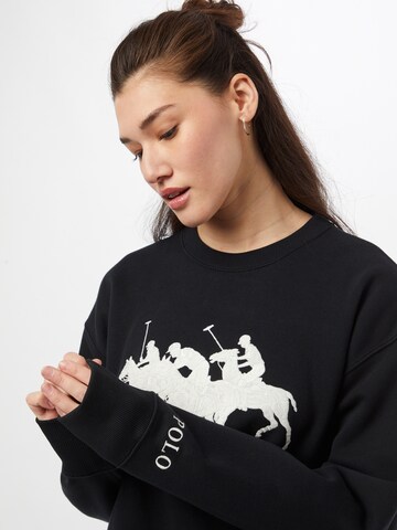 Polo Ralph LaurenSweater majica 'HEARD' - crna boja