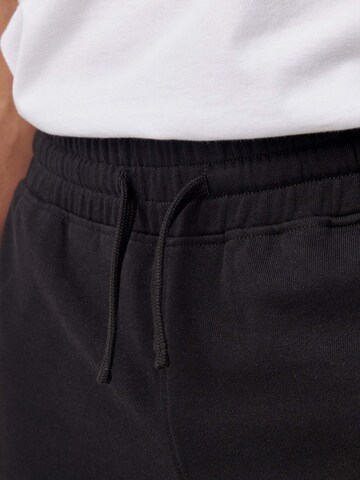 SNOCKS Tapered Functionele broek in Zwart