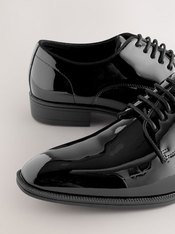 Chaussure à lacets Next en noir