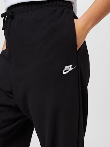 Nike Sportswear Tapered Workout Pants in Black