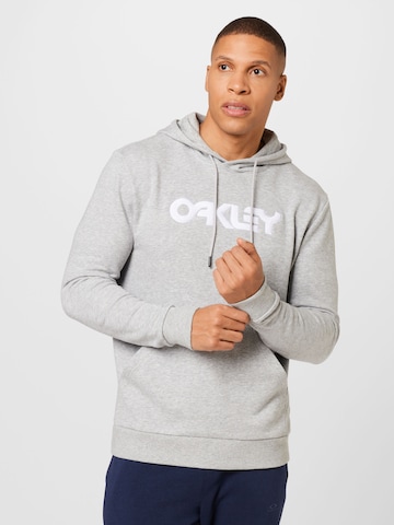 OAKLEY - Sweatshirt de desporto 'TEDDY' em cinzento: frente