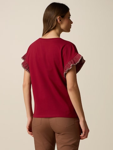 Maglietta di oltre in rosso