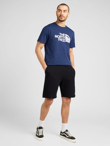 THE NORTH FACE T-shirt 'WOODCUT DOME' i blå