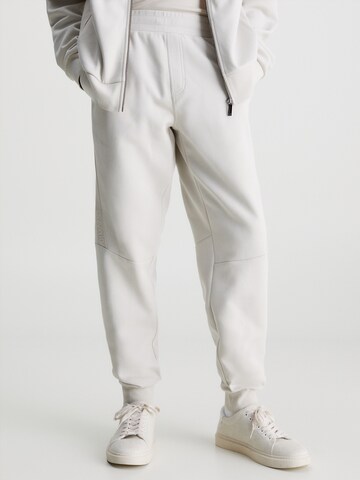 Calvin Klein Tapered Pants in Beige: front