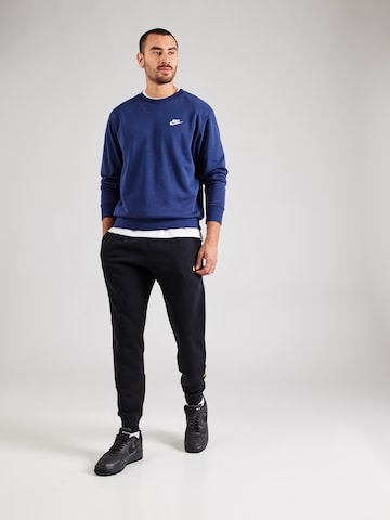 Nike Sportswear Tapered Broek in Zwart