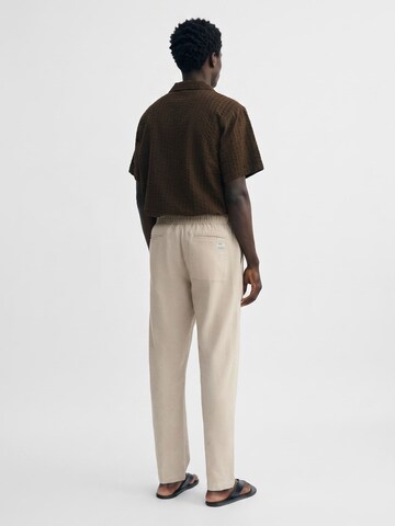 Thinking MU Baggy Broek 'TRAVEL PANTS LIGHT BEIGE' in Beige